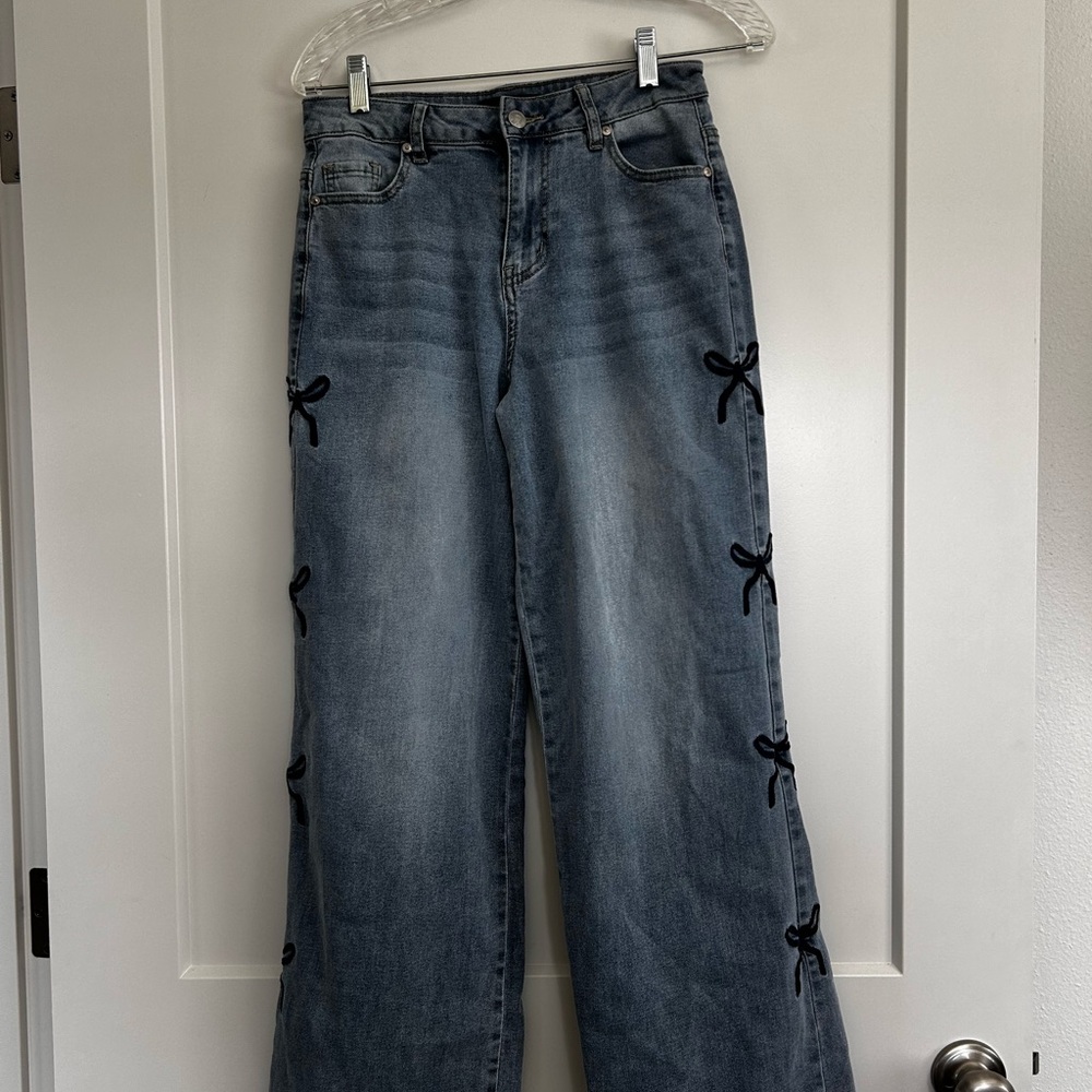 Women's Blue Jeans with Bow Accents size 2
